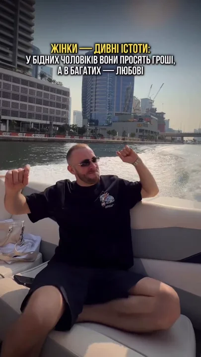 Boat pose: bent elbows, loose black outfit