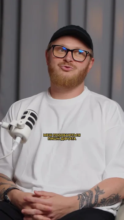 Plain interview crop with small yellow text